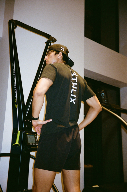 Athlix coach training client on equipment